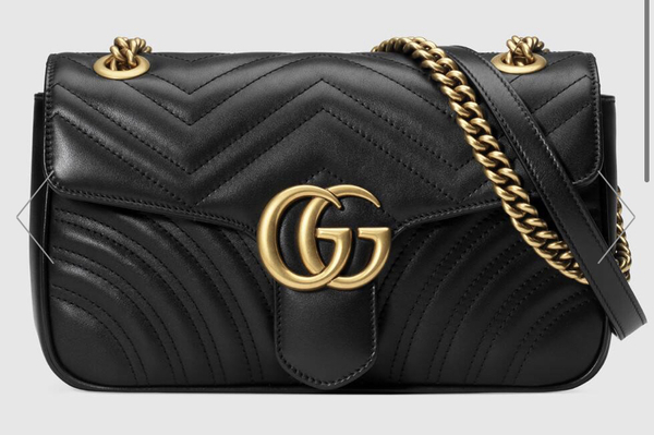 Black cross body bag budget £1000. Gucci Marmont?