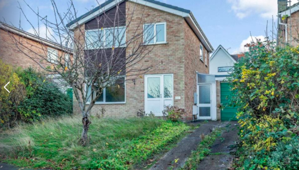 How can the front of this ugly house be made nicer on the cheap please?