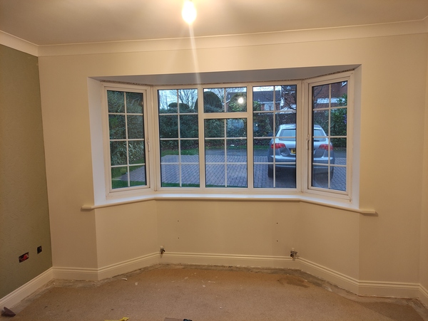 Curtains into bay with dropped ceiling