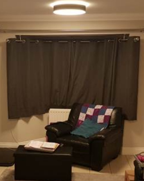 Curtains into bay with dropped ceiling