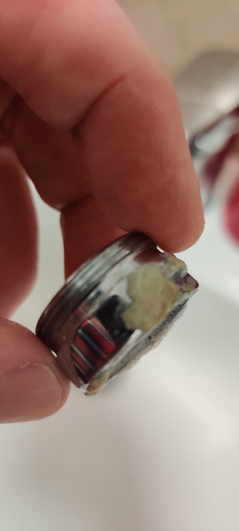 Wtaf is this on/ in my taps and how do I get rid of it
