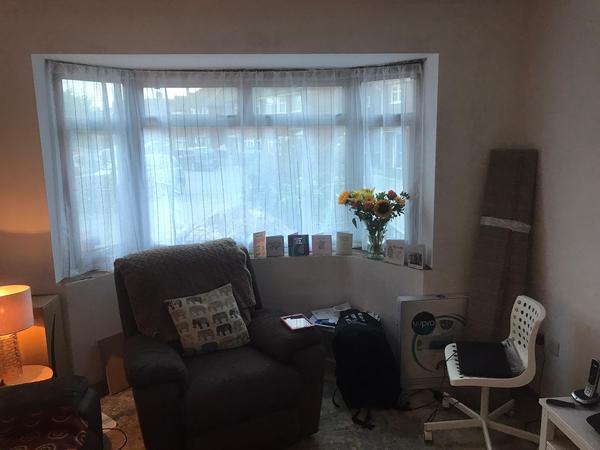 Curtains into bay with dropped ceiling