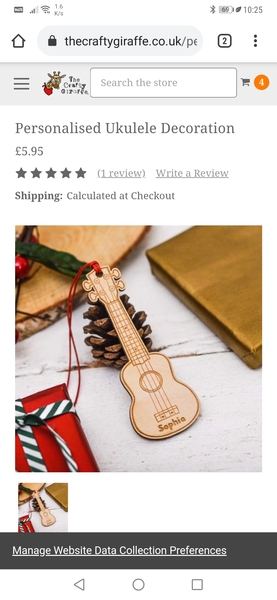 Long shot...  ukulele christmas tree decoration?
