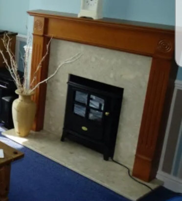 DIYers- what could I do with this fireplace. Will I need a professional?