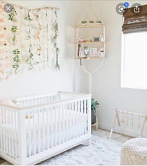 Are personalised name signs above the cot tacky?