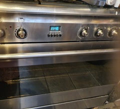 Any tips for cleaning the glass door of an oven?