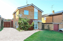 How can the front of this ugly house be made nicer on the cheap please?