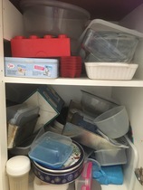 Would anyone like to join me today in sorting out the avalanche cupboard? Tupperware.