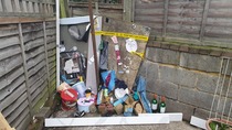 Neighbour has started hoarding rubbish in communal parking area - what are my rights?