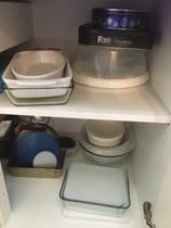 Would anyone like to join me today in sorting out the avalanche cupboard? Tupperware.