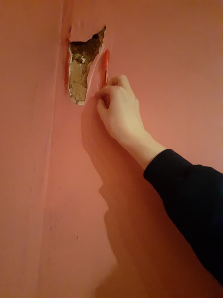 Damp patch in middle of wall soggy beneath plaster