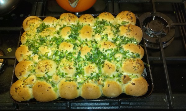 How many people does one standard garlic baguette serve in your house?