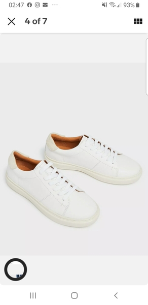 Can this jumpsuit be worn with white trainers?