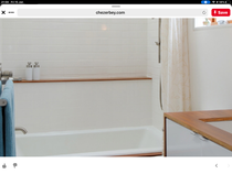 Shower ledge over bath to give elbow room