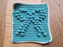 Woolly Hugs. A Blanket for the lovely Needschoolhelp. Remembering baby Alfie. Crafters and donors, we need your help.