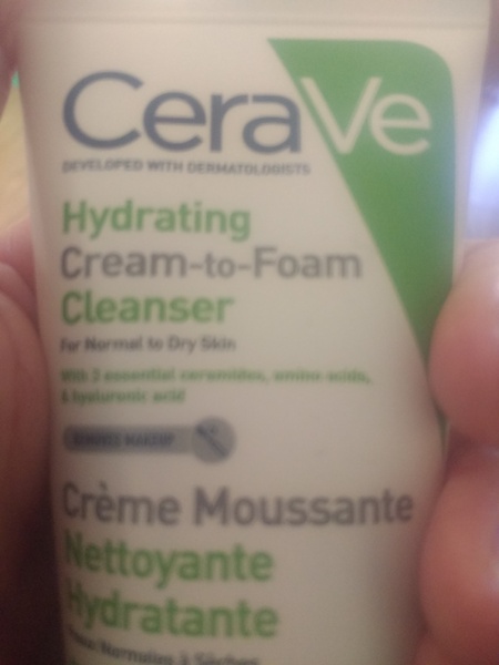 Black heads on young teens face.