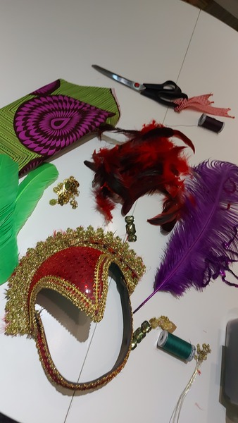 Glueing feathers and fabric and pipe insulation?