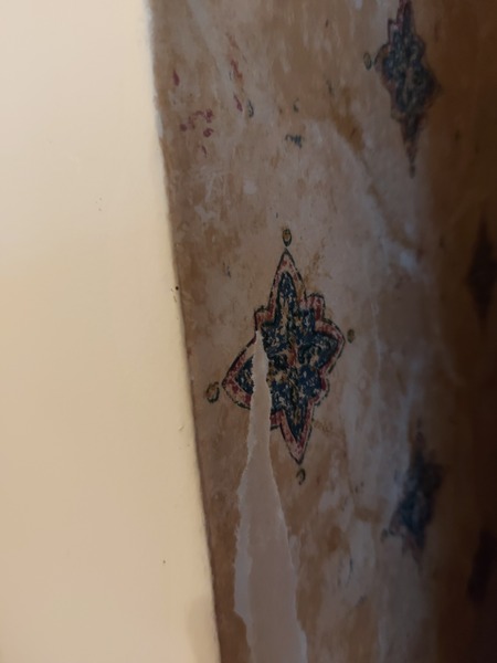 Paint on wallpaper - what to do?