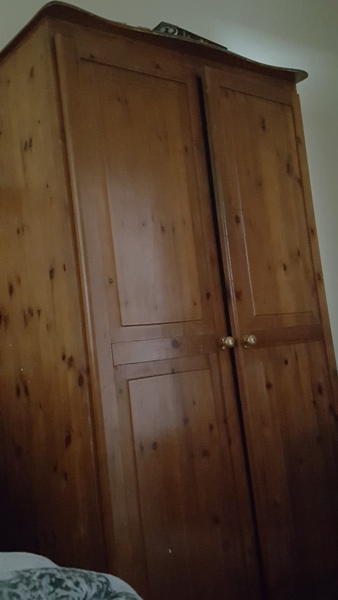 I bought a pre owned wardrobe now the place has bad energy..
