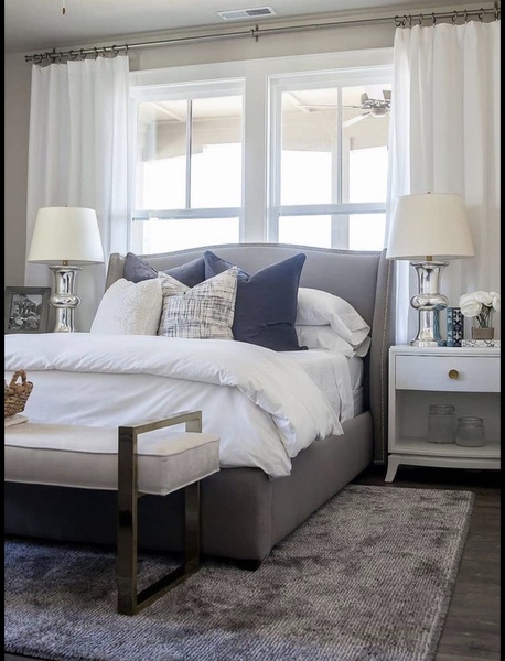 Small bedroom - wardrobes...over the bed or small gap at the end of the bed?
