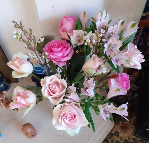 To be annoyed that my sister has sent me postal flowers and....