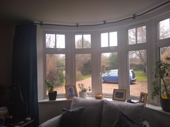 Curtains - very curved bay window - help!