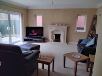 Fireplace in new house - keep or replace