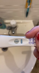 Digital says not pregnant but line there?
