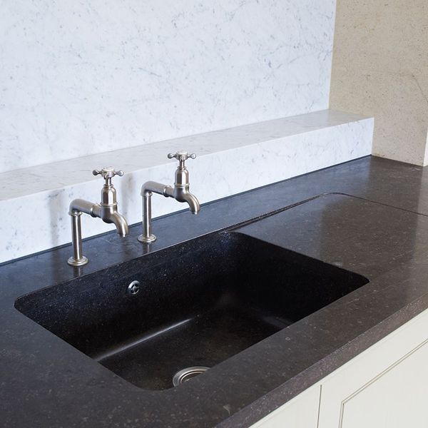 Draining dishes in modern kitchen