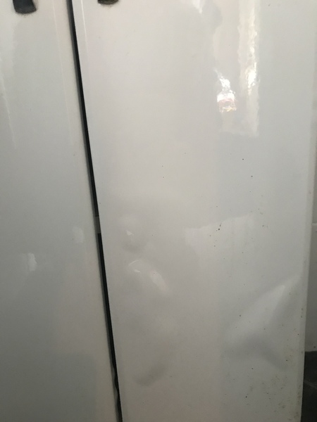 Bathroom cabinet has ‘bubbled’? (Photo included)