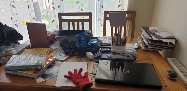 The mounting mountain of stuff on the table, anyone else