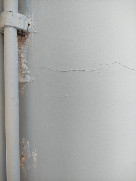 Paint peeling and bubbling on ground floor - how to treat damp?