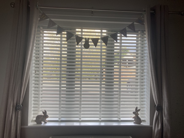 Wooden blinds with tape