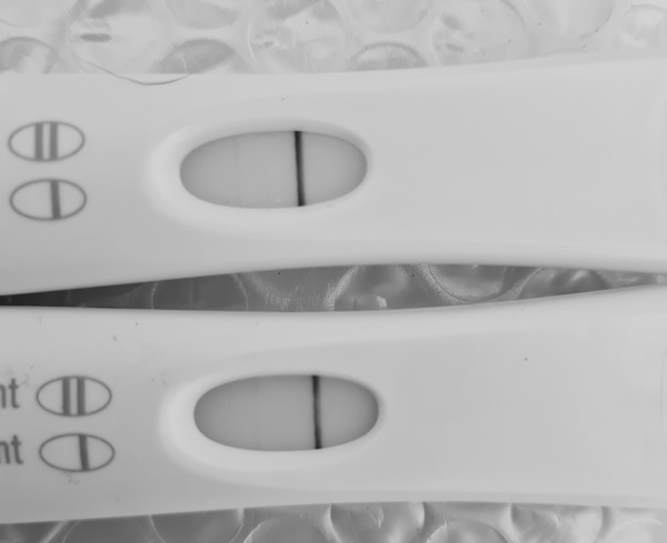 Pregnant or positive from pregnancy loss :(