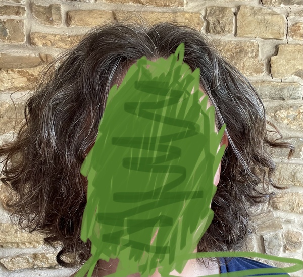What do I need to de-fluff curly hair?