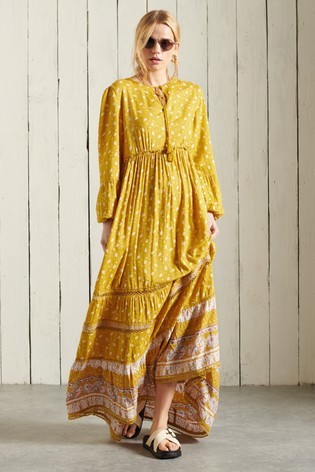 I want a long floral maxi dress. Something that a girl in a Flake ad would wear