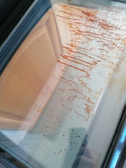 Please tell me how to clean my oven door