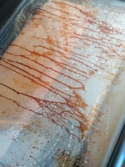 Please tell me how to clean my oven door