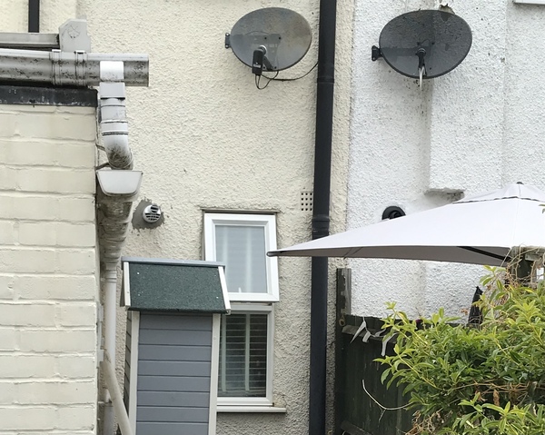 Neighbour’s parasol overhangs our garden