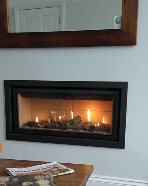 Hole in the wall fireplace Vs fireplace with mantel