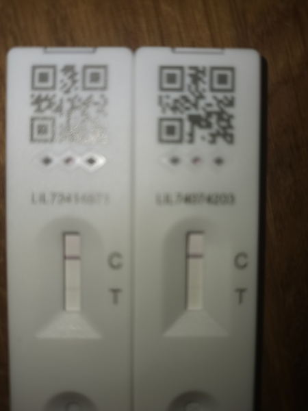 Help! Lateral flow result unsure and vaccine today!!