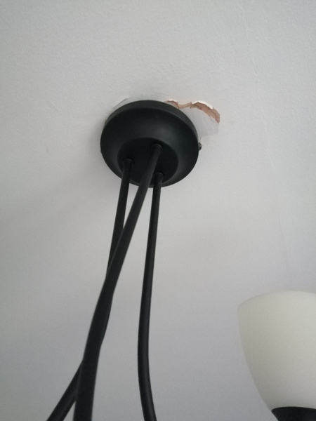 Light fitting has come away from ceiling
