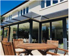 What options against excessive heat in south-facing kitchen? Awnings window films blinds...