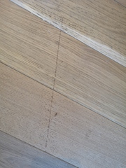 Repairing scratches in this floor