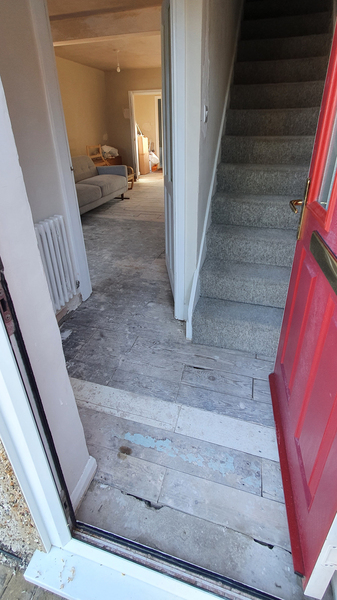Tile small entrance or wood flooring planks throughout?