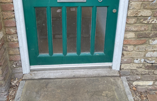 AIBU to wonder if it possible to fit a catflap in this door?