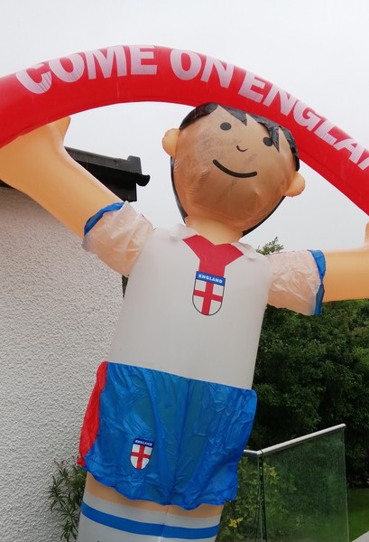 Déclassé for adults  to wear football strip and decorate their house with flags for the Euros?