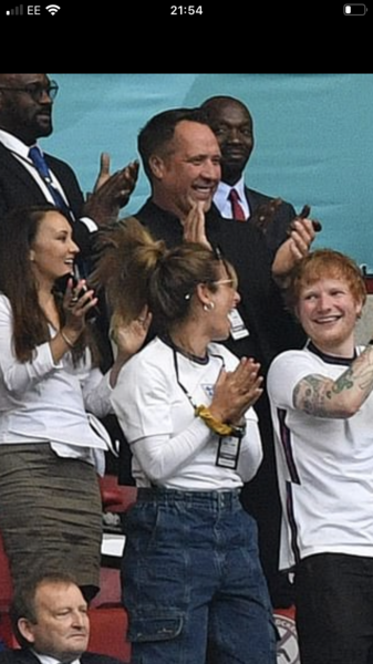 Who was the woman sat behind Ed Sheeran tonight?