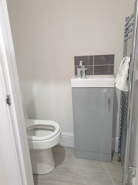 Toilet off kitchen. Thoughts?