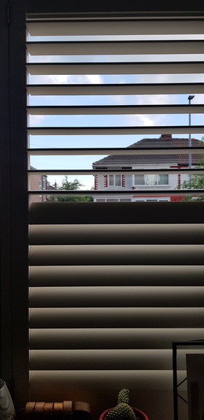 vertical blinds v.s net curtains who wins the day ?